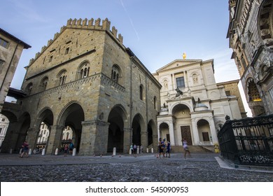 BERGAMO, ITALY - August 6, 2016: Monuments of the Citta Alta (upper city) of Bergamo: the Palazzo della Ragione and the Duomo (cathedral).