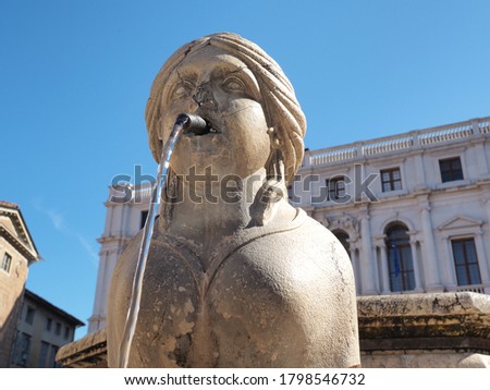 Bergamo, Italy. Close-up of the sphinx from whose mouth the water of the fountain flows. The Contarini fountain located at the main square at the old town. Best monument of the city