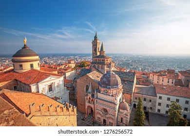 Bergamo, Italy.  Scenic view of the old town city center and Basilica of Santa Maria Maggiore and Cappella Colleoni in Citta Alta. Landscape of the historical buildings during the sunset.