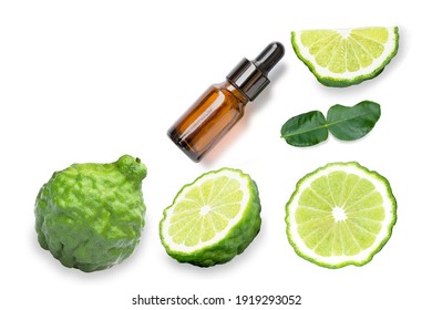Bergamot essential oil and kaffir fruit isolated on white background. Top view. Flat lay.