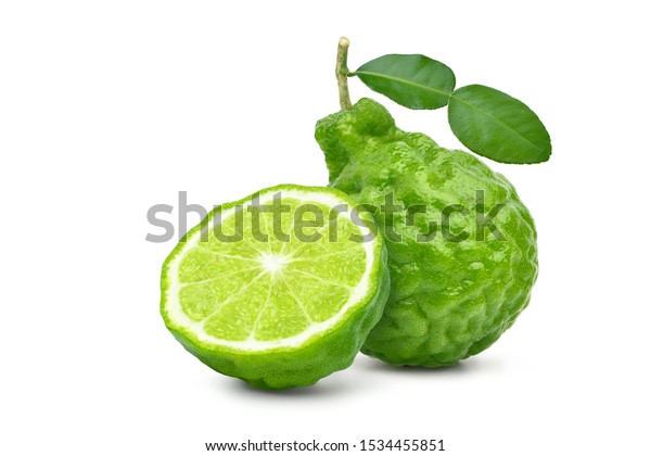 Bergamot fruit with cut in half and leaf\
isolated on white background. Clipping\
path.