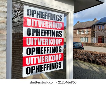 Bergeijk, The Netherlands, February 11th 2022. Closing Down Final Sale Of A Retail Store Due To The Corona Crisis. Poster On The Window Of A Local Business Saying 'opheffingsuitverkoop': Closing Down