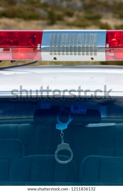BERGEN, NORWAY - 4/29/18: View of the front\
window and police lights of a  1981-1985 Chevrolet Caprice Classic\
California Highway Patrol vehicle during a classic american car\
owners meeting.