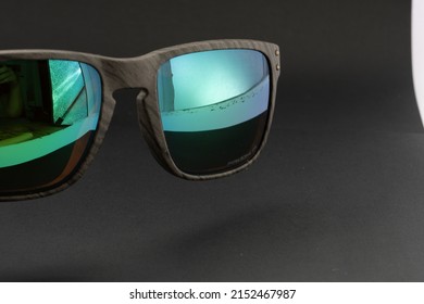BERGEN, NORWAY - Feb 28, 2022: A closeup of Oakley sunglasses on black background
