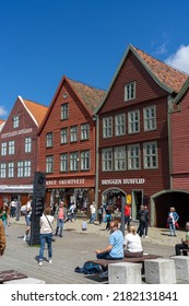 Bergen Norway June 22, 2022: Famous Historic Shopping Street Strandgaten In Bergen With Many Tourists Eating And Dining Outside