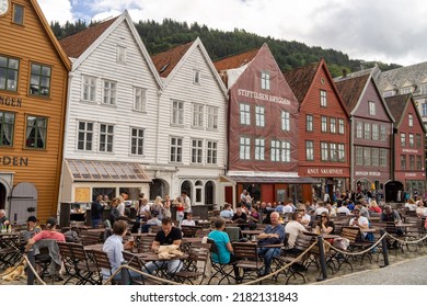 Bergen Norway June 22, 2022: Famous Historic Shopping Street Strandgaten In Bergen With Many Tourists Eating And Dining Outside