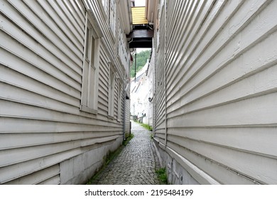 Bergen Old Historical Town, Narrow Streets, White Historical Wooden House Of Bergen, No People, Bergen Old Town, Norway, Europe, July 2016.