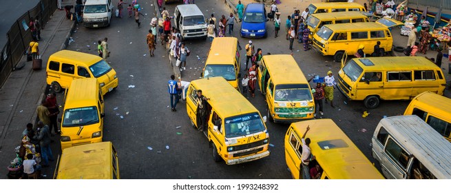 Berger, Lagos. - May 2, 2021: Lagos Traffic And Yellow Buses