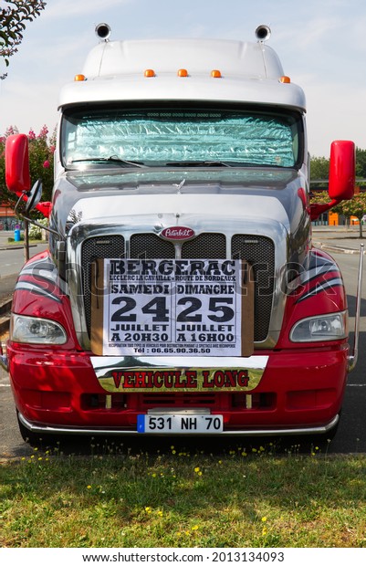 Bergerac, Dordogne:France. July 23rd 2021. A huge\
red American style truck advertising the Monster Truck show in\
Bergerac in July.