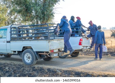 Bergville, South Africa - July 16, 2019: Unidentified Black Farm Workers Are Dropped Off At Roadside At The End Of A Work Day Image In Landscape Format