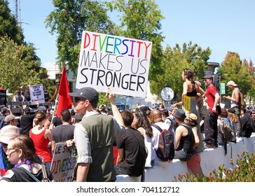 Berkeley, CA - August 27, 2017: Unidentified participants at the NO TO MARXISM IN AMERICA rally in Martin Luther King Jr. Civic Center Park, more counter-protesters than protesters.