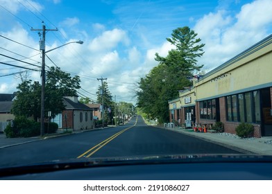 Berkeley Heights, NJ, USA - 09-21-2021: Driving Main Street Of Small Town America At The End Of Summer