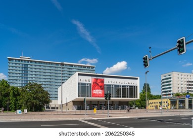 Berlin 2021: Kino International is a large-capacity cinema from GDR times in Karl-Marx-Allee. View diagonally from the front. In the background the Bürgeramt and Rathaus Mitte. 