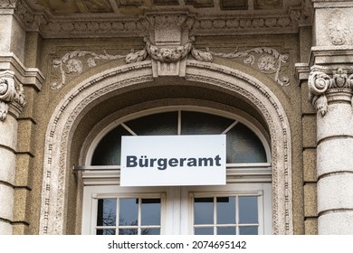 Berlin 2021: Sign with inscription Bürgeramt (Citizens' Office) in front of a decorative portal.