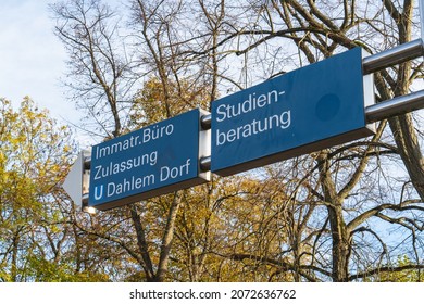 Berlin 2021: Signposts On The Campus Of Freie Universität Berlin To Various Faculties, The Enrollment Office, And The Student Advisory Service.