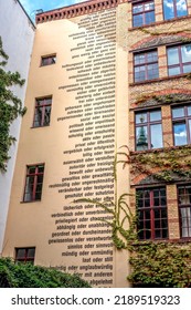 berlin, 2022, june, 22, contradictions on a house wall in a backyard in the capital