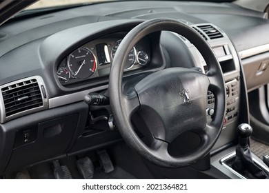 Berlin - April 2014: Peugeot 407 2003-2010 sedan pre facelift interior dashboard cockpit steering wheel and mechanic manual transmission gearbox. - Shutterstock ID 2021364821