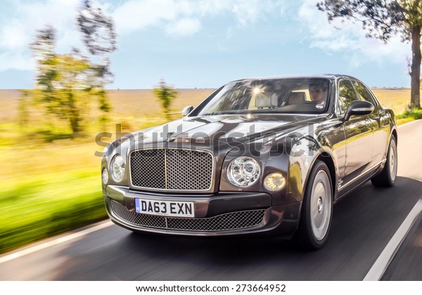BERLIN -
AUGUST 17, 2014: Bentley Mulsanne at the test drive event for
automotive journalists. Bentley Mulsanne is powered by 6.75 liter
V8 twin-turbo, which produces 512 hp of
power.
