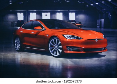 Berlin, August 29, 2018: Photo of the image of an electric vehicle Tesla at the Tesla motor show in Berlin. A modern electric car.