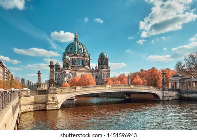 Berlin Cathedral with a bridge over Spree river in Autumn, toned image
