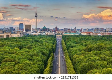 Berlin City Skyline In Germany, Aerial View Above Tiergarten Park Towards The Brandenburg Gate.