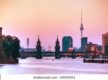 Berlin Cityscape With Oberbaum Bridge In The Evening