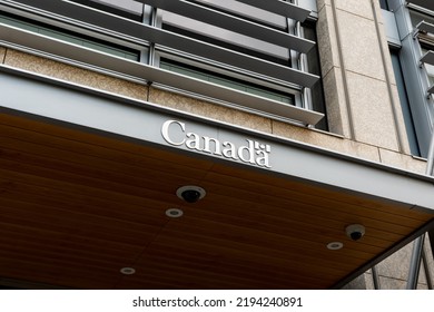 BERLIN, GERMANY - 12. August 2022: Canada Lettering On The Building Entrance Of The Canadian Embassy At The Potsdamer Platz In Berlin. Silver Logo With A Small Canadian Flag. Politics In The Capital.