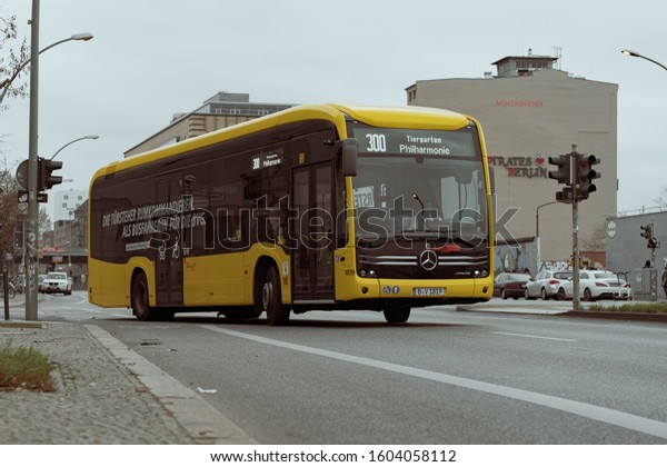 berlin, germany,\
20200101: public transportation, yellow bus, electric vehicle,\
retro style image\
editing