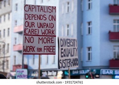 Berlin, Germany 3-8-2020 International Women's Day march in Berlin. Makeshift protest signs criticizing capitalism, advocating for equality and diversity. Women Fighting Day 8m Demonstration