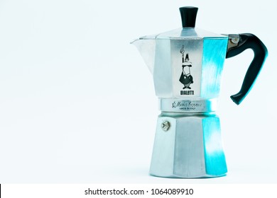 Berlin, Germany - April 08 2018: Bialetti Moka Express - Italian Coffee Maker, made of Aluminum - isolated against white Background
