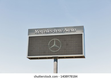 BERLIN, GERMANY - APRIL 18, 2019: Mercedes-Benz Arena advertisement electronic board against clear blue sky. It is a multipurpose indoor arena in the Friedrichshain neighborhood, opened in 2008.