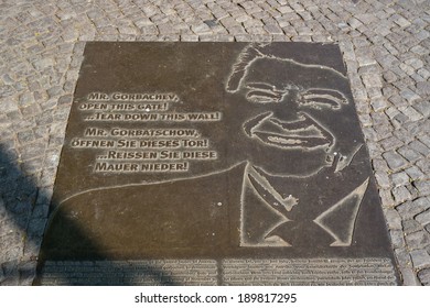 BERLIN, GERMANY - APRIL 19, 2014: Memorial Plate In Place Of The Berlin Wall With A Fragment Of The Text Of U.S. President Ronald Reagan: 