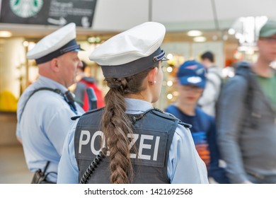 BERLIN, GERMANY - APRIL 20, 2019: Police Patrol In Tegel Airport. Police On High Terror Alert Warned To Be Hyper Vigilant. Berlin Is The Capital And Largest City Of Germany By Both Area And Population