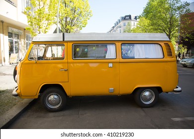 Berlin, Germany - April 21, 2016: German classic orange van Volkswagen Transporter. Side view
