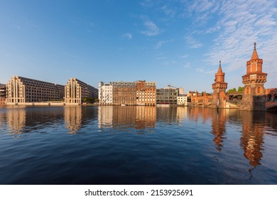 Berlin, Germany, April 24. 2022, cityscape view of Berlin Kreuzberg  as seen from across the river Spree, with the Oberbaum Brücke on the right. 