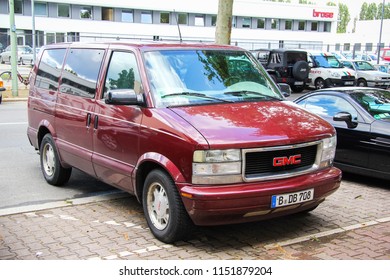 Berlin, Germany - August 12, 2014: Passenger Van GMC Safari In The City Street.