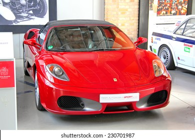 BERLIN, GERMANY - AUGUST 12, 2014: Red italian sports car Ferrari F430 Spider in the museum of vintage cars Classic Remise.