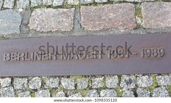 Berlin,\
Germany - August 17, 2017: Big plaque with text Berliner Mauer that\
means Berlin Wall in German language and\
dates