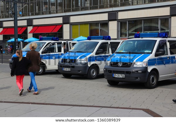 BERLIN, GERMANY - AUGUST 26, 2014: Police cars\
wait in Berlin. Federal Police (Bundespolizei) of Germany has\
30,000 officers.