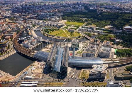 Berlin, Germany. Central station (Hauptbahnhof) in the foreground and the government district in the background with the Reichstag and  Federal Chancellery.