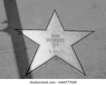 BERLIN, GERMANY - CIRCA JUNE 2019: Wim Wenders Star On The Boulevard Der Stars (the Walk Of Fame) In Black And White