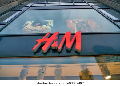 BERLIN, GERMANY - CIRCA SEPTEMBER, 2019: close up shot of H & M storefront as seen from a street in Berlin.