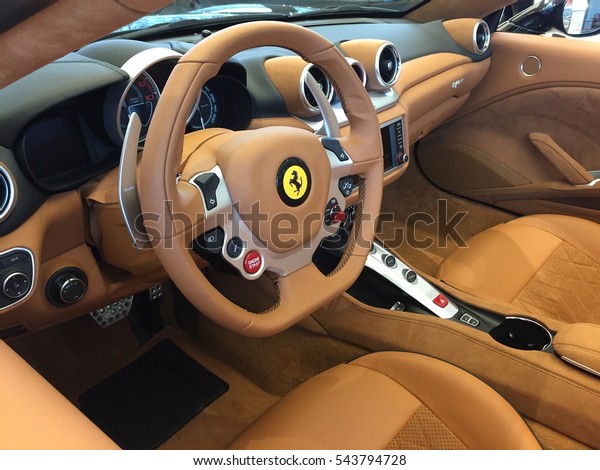 Berlin, Germany - December 19, 2016: Ferrari car\
steering wheel. Ferrari SpA is an Italian sports car manufacturer\
based in Maranello. Founded by Enzo Ferrari, the company built\
first car in 1940