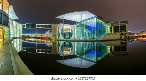 Berlin / Germany - February 16, 2017: The Marie-Elisabeth-Lüders House, parliamentary complex in the new government quarter of Berlin, reflecting in Spree river