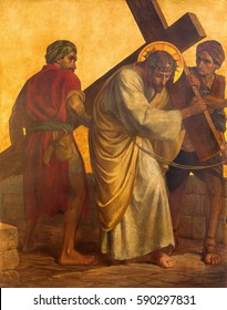 BERLIN, GERMANY, FEBRUARY - 16, 2017:  The paint on the metal plate - Simon of Cyrene helps Jesus carry the cross in church St. Matthew  by Philipp Schumacher (1907 - 1915).