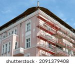 Berlin, Germany - house renovation with scaffolding 