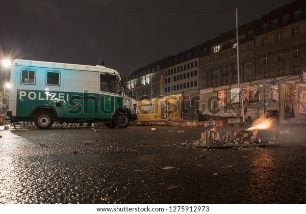 BERLIN, GERMANY -\
JANUARY 1, 2019: 2018: Police car on the blocked street after New\
Year Eve celebrations. 