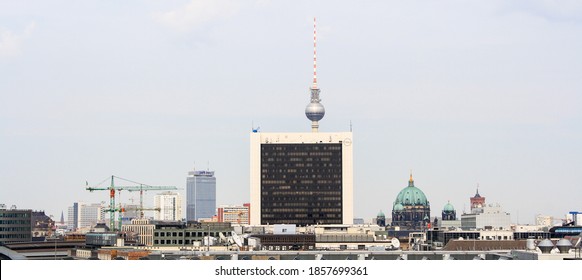 Berlin, Germany - July 2010: Berlin Cityscape In Summer With View Of The Famous Berlin TV Tower, Berliner Dom And International Trade Centre. Panorama View With Clear Blue Sky Background. No People. 