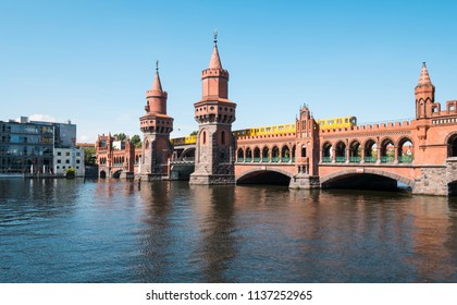 Berlin, Germany - July 2018: Subway Train Crossing The Oberbaum Bridge (Oberbaumbrücke) In Berlin, Germany