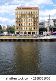 Berlin, Germany, July 5, 2022, View Over The River Spree To A Single Old Building At Schiffbauerdamm